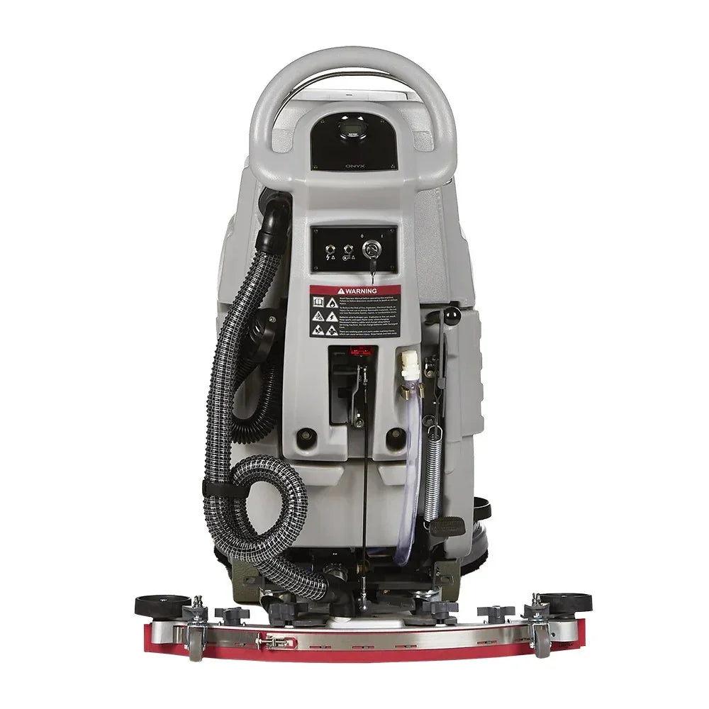 Walk-behind ONYX DX20 floor scrubber in commercial facility