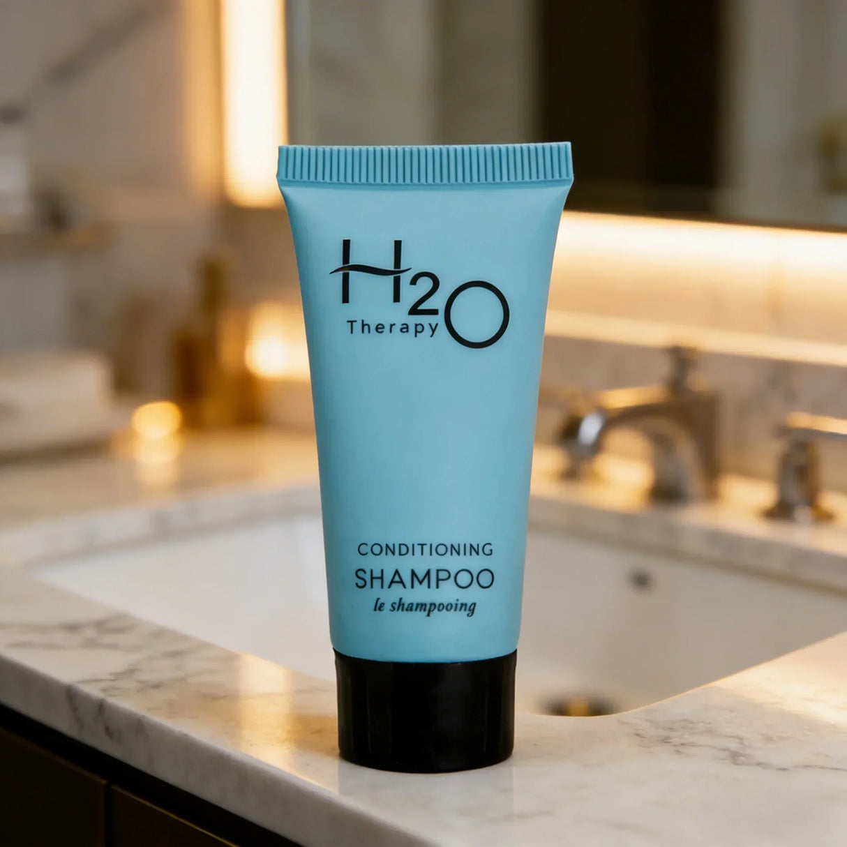 H2O Therapy Conditioning Shampoo tube on bathroom counter, janitorial supply store product